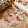 Round rug featuring a pink background with colorful koi fish and floral patterns.