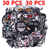 A pile of random mixed black and white punk embroidered patches for DIY clothing