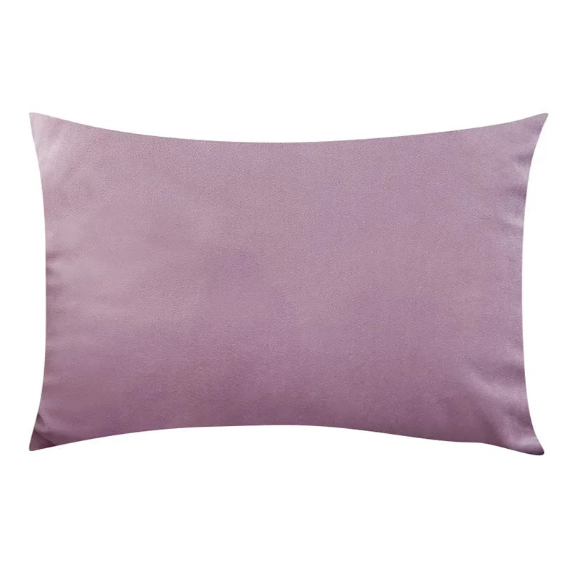 A square, mauve velvet throw pillow cover with a smooth texture.
