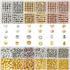 A collection of colorful geometric acrylic beads in various shades including gold, silver, and bronze for jewelry making.
