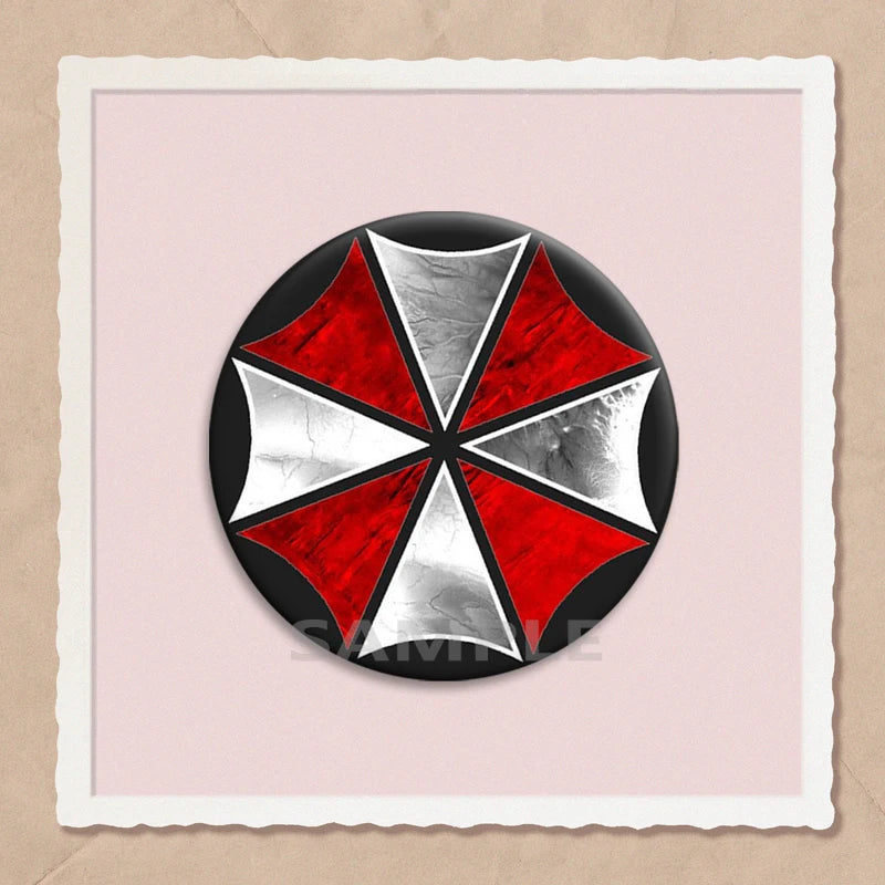 A round brooch pin featuring a geometric design with alternating red and silver sections on a light pink background.