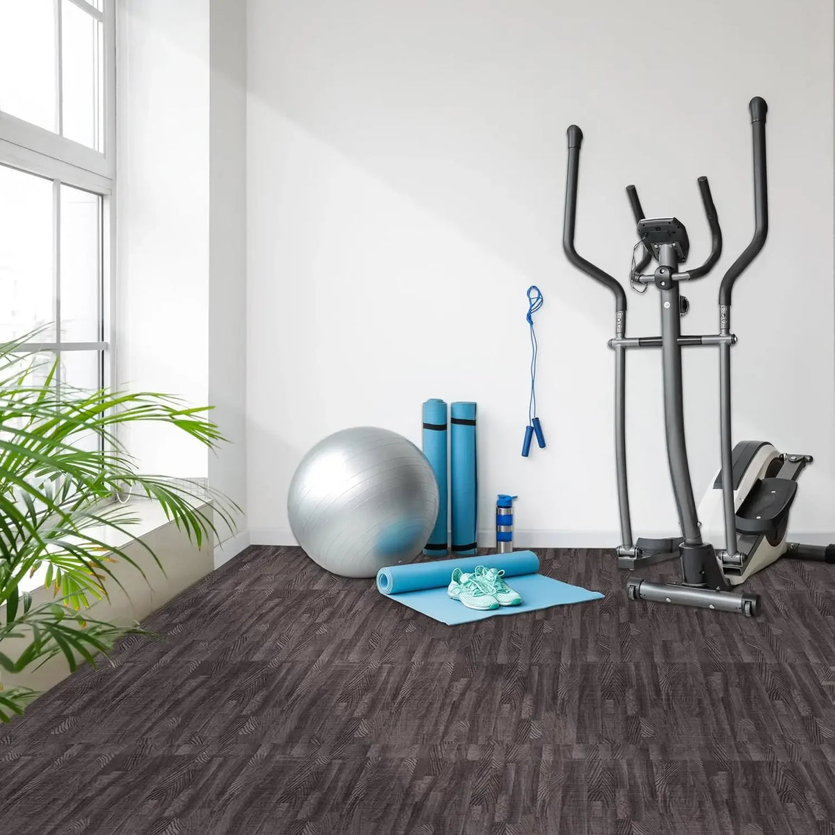 A set of wood grain interlocking foam floor mats and a home gym pull-up bar are displayed in a bright room.
