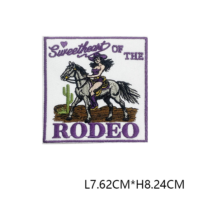 Embroidered patch featuring a black horse and purple rider with the text Sweetheart of the Rodeo