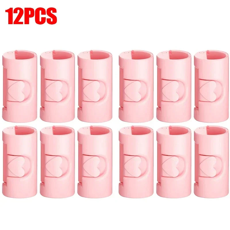 Twelve pink non-slip bed sheet grippers with adjustable clips arranged in a row.