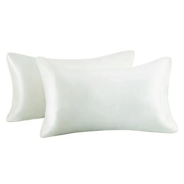 A white silky satin pillow cover for a queen size pillow.