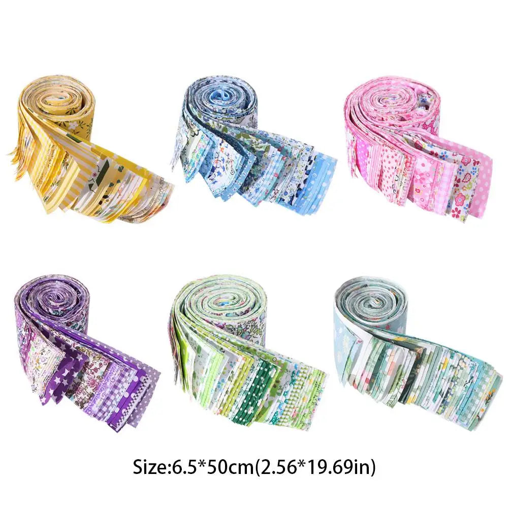 A collection of rolled floral cotton fabric in various colors and patterns for quilting and crafting
