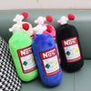 A set of three plush bottles shaped like car necks pillows and waist cushions in green, blue, and black.