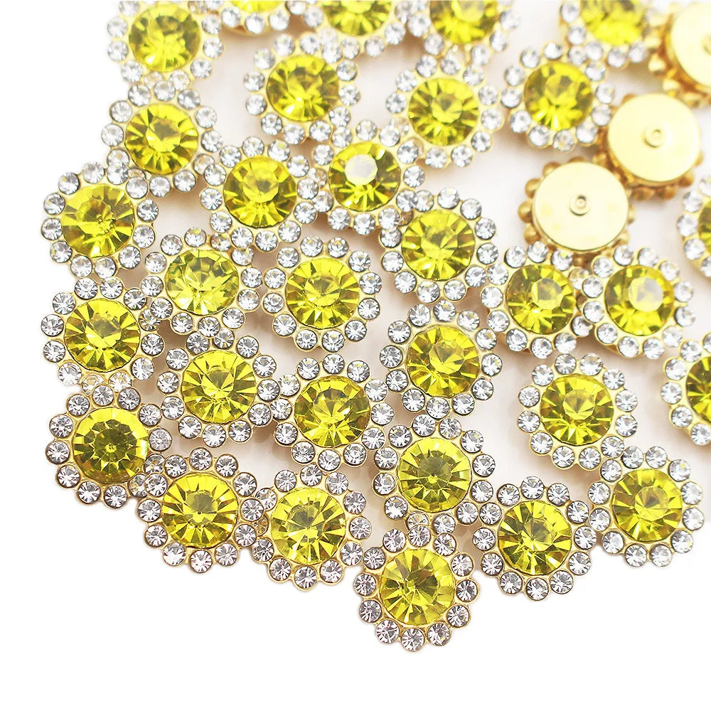 Gold and clear crystal rhinestone buttons shaped like sunflowers arranged in a floral pattern