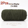 Two packs of dark olive green elastic yarn displayed for crafting