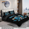 A set of three funny printed duvet covers featuring blue cartoon characters on a black background displayed on a bed.