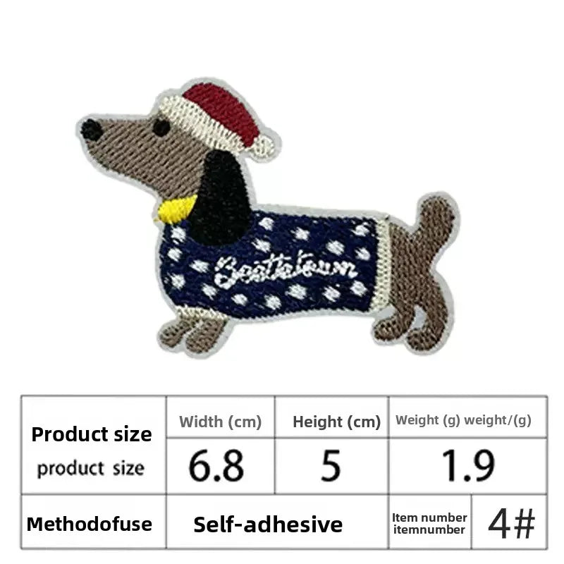 An embroidered dog patch in brown and black colors with a red hat.