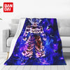 A vibrant anime character flannel throw blanket featuring a muscular figure in purple and blue light against a dark backgroun
