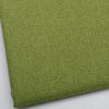 Close-up of coarse olive green linen and cotton fabric texture.