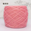 Pink metallic silk crocheting and knitting yarn in a ball