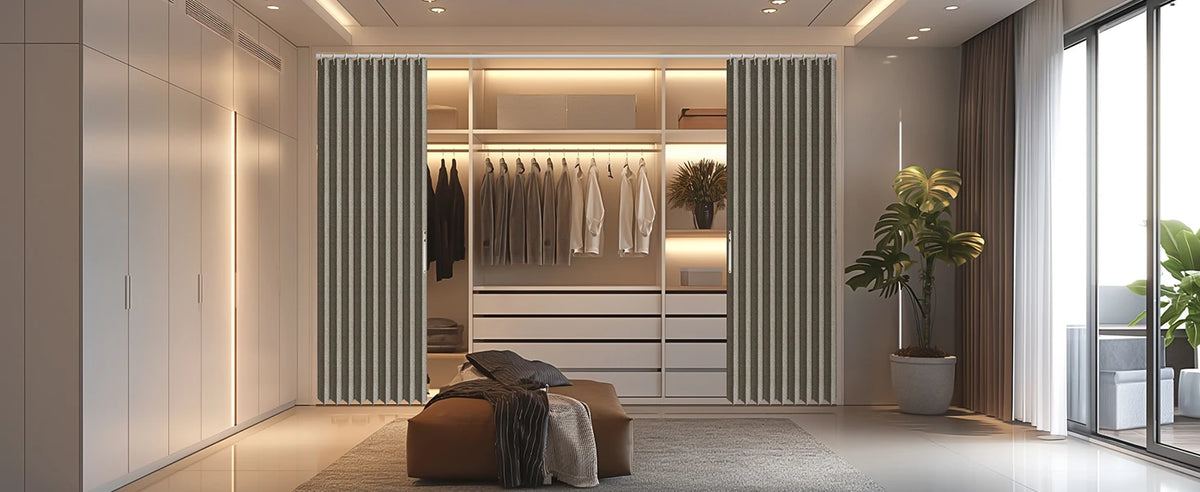 A modern closet interior featuring a magnetic accordion pleated door curtain dividing the space.