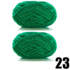 A ball of thick, bright green velvet yarn used for knitting and crochet projects.