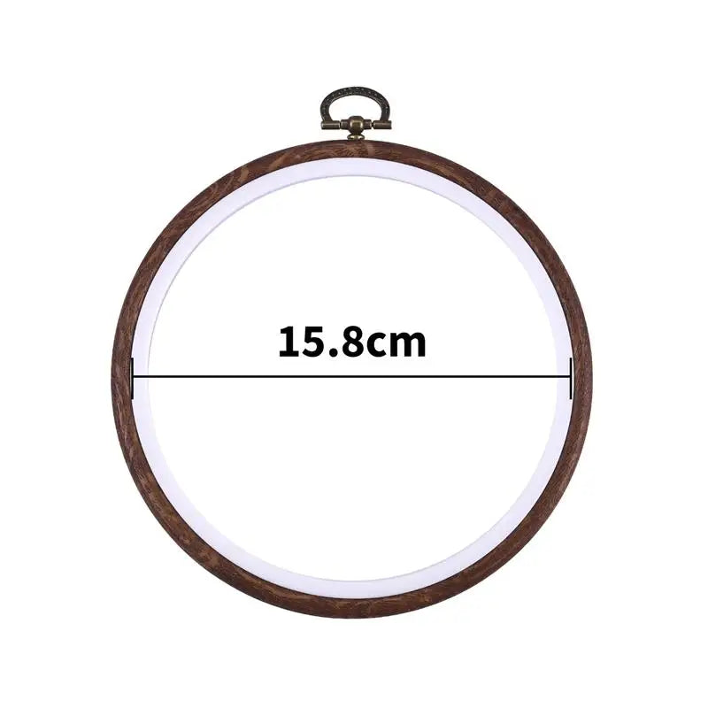 Round wooden embroidery hoop with a metal hook, showing a diameter of 15.8cm.