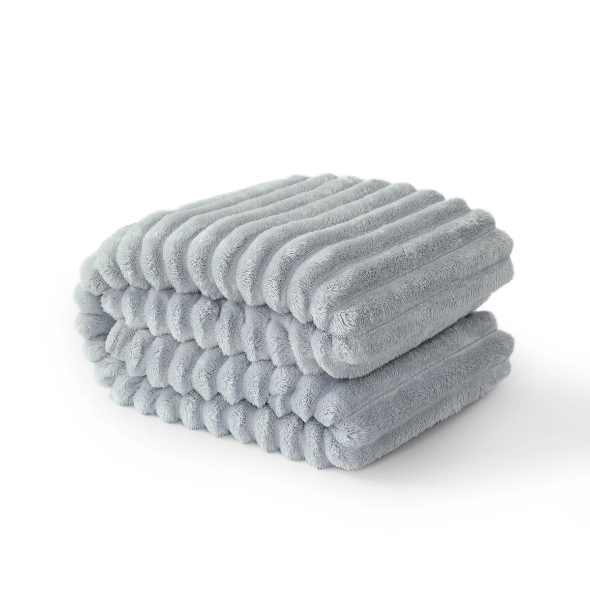 A stack of soft gray striped flannel throw blankets folded neatly.