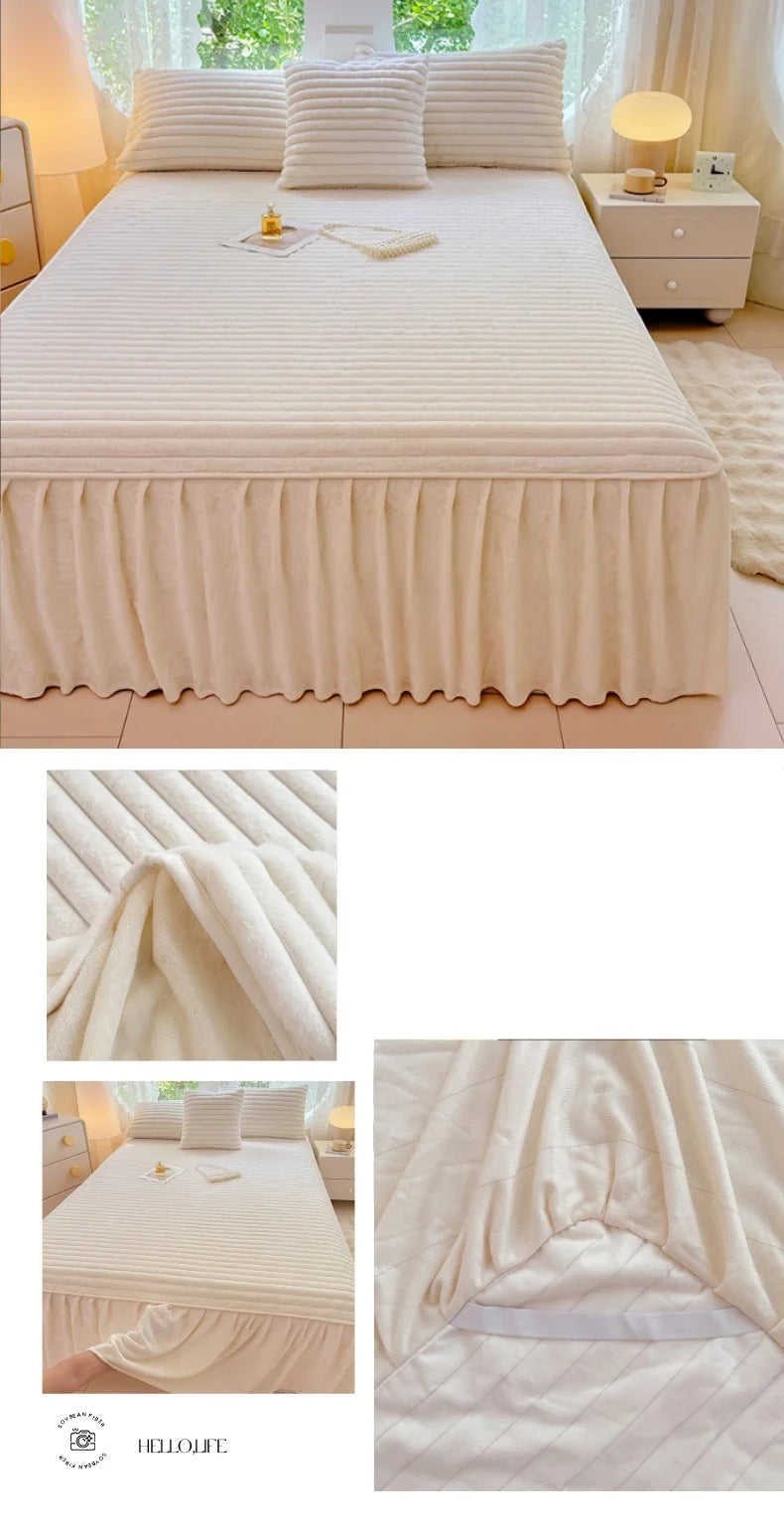A plush linen bed skirt set in cream color with a ribbed texture shown on a bed.