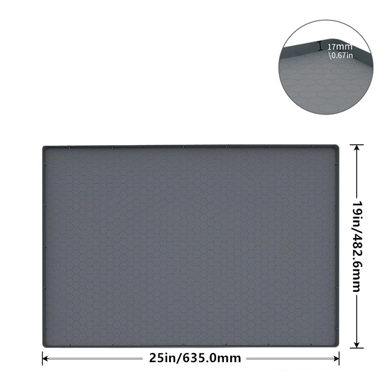 A rectangular gray silicone under sink drain mat measuring 25 inches by 19 inches.