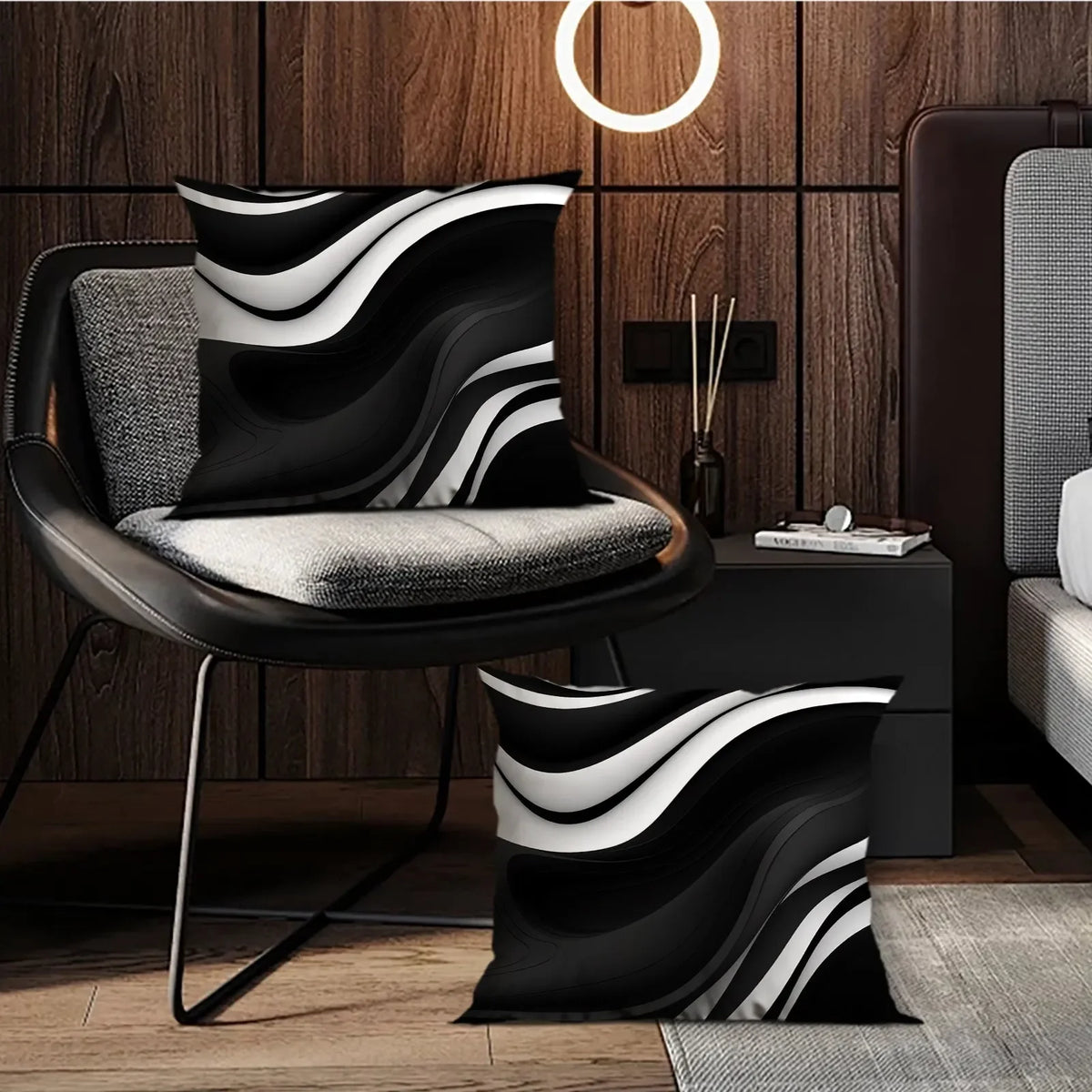 A decorative pillowcase with a black and white wavy geometric pattern displayed on a modern chair.