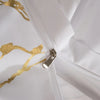 White luxury marble printed duvet cover featuring gold leaf detailing and a silver zipper.