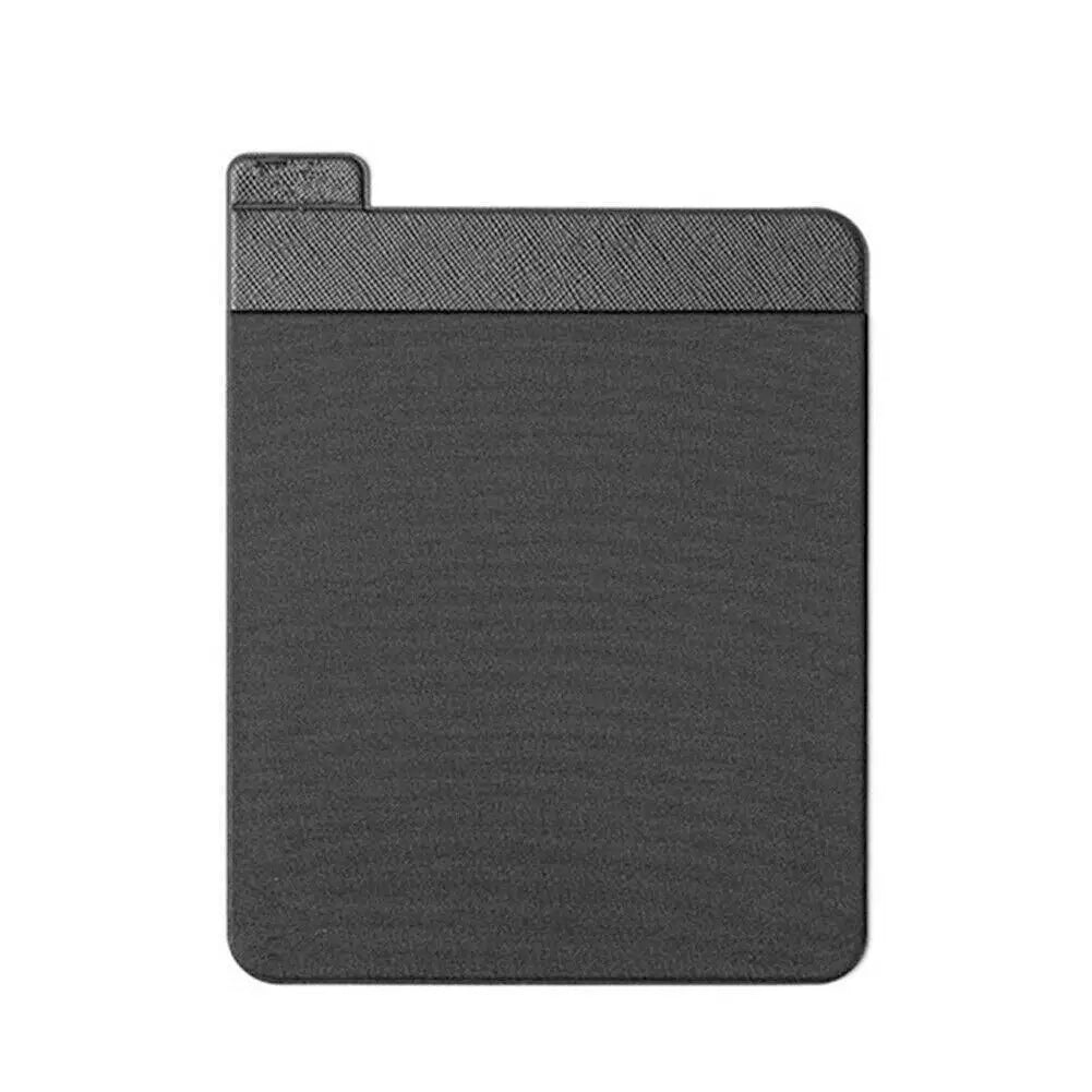 A black adhesive laptop back storage pouch with a textured surface.