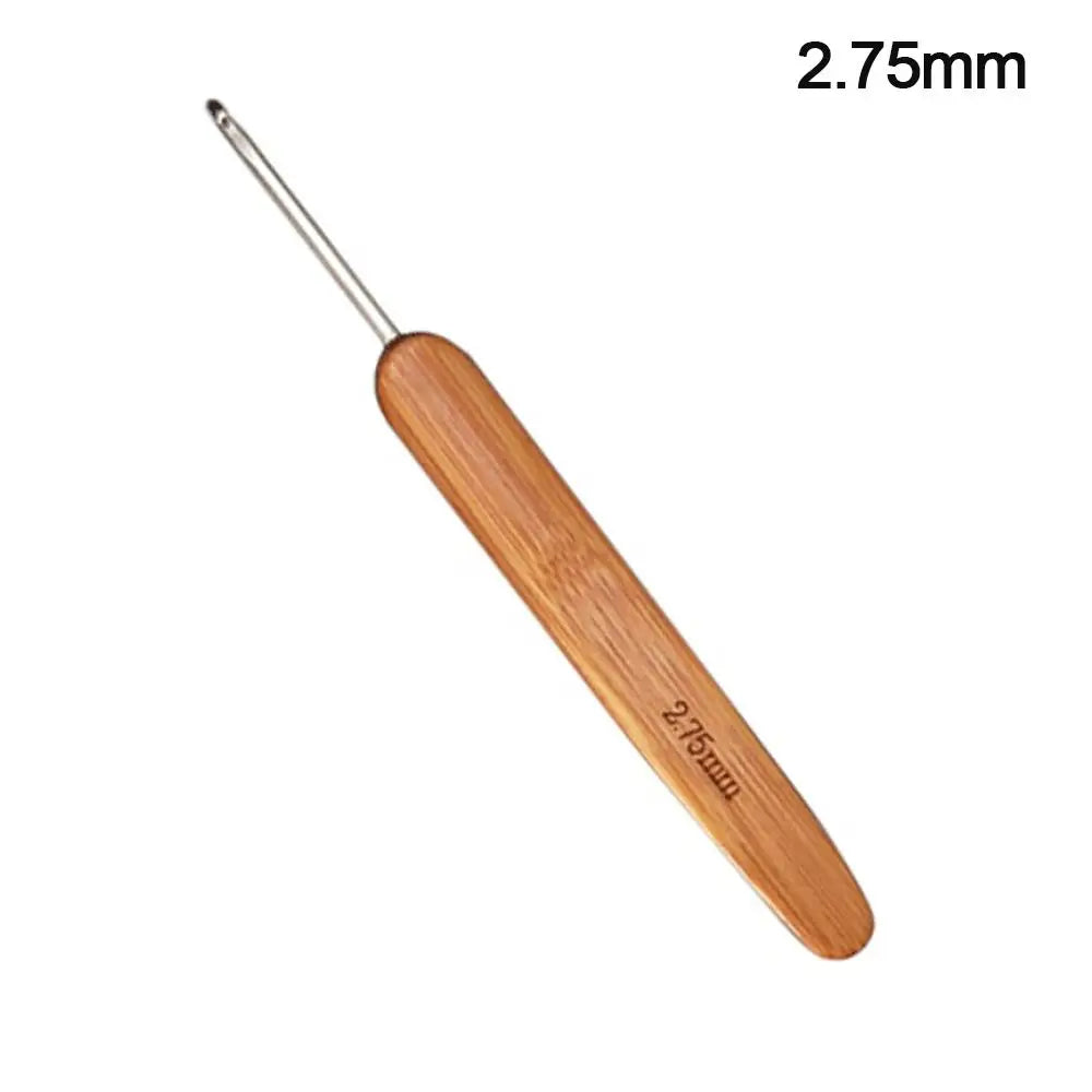 A pair of wooden crochet and knitting needles with a 2.75mm size marking.