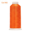A spool of bright orange high tenacity machine embroidery thread.