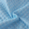 Light blue ice silk cooling pillowcase fabric with a textured, quilted pattern.