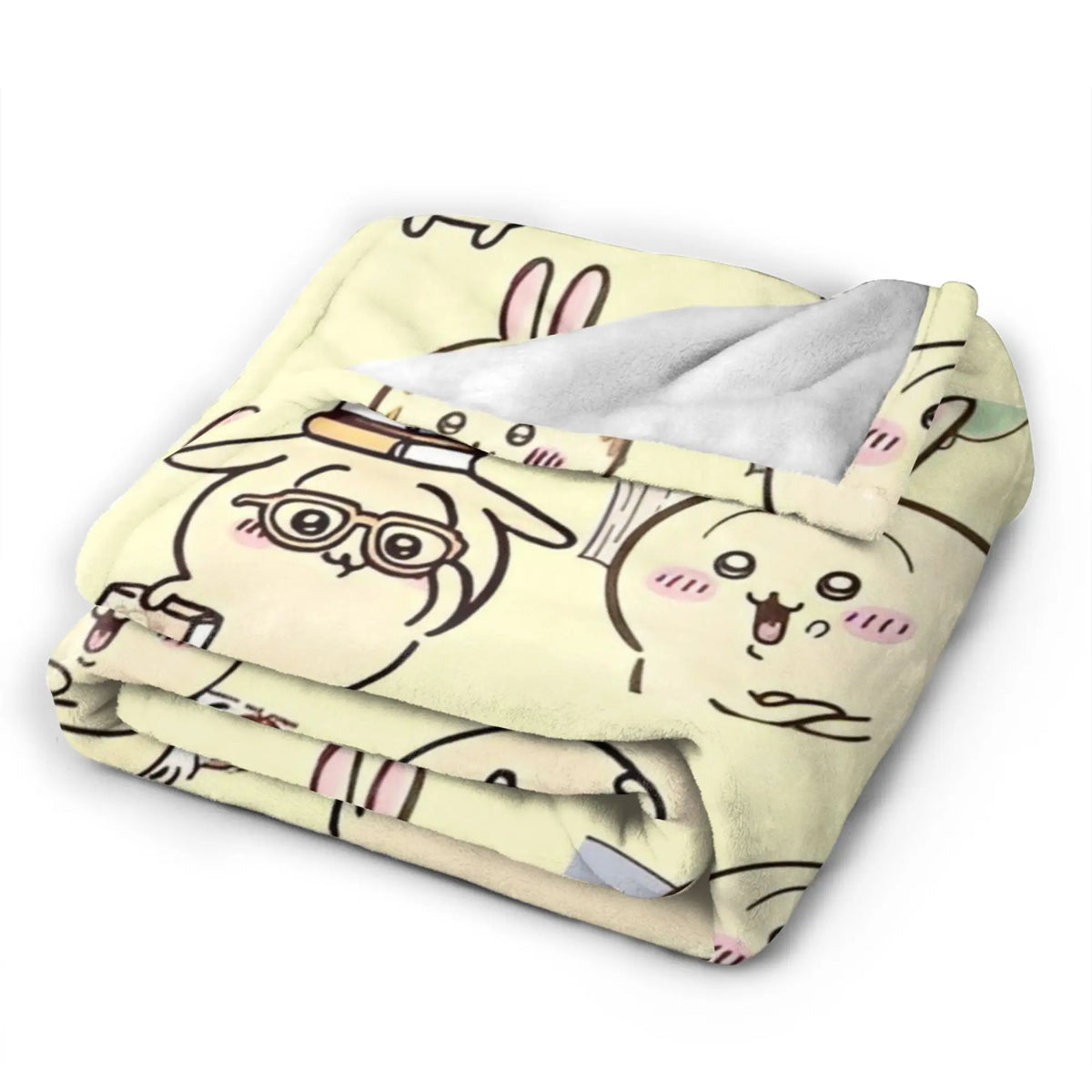 A soft, light yellow flannel throw blanket featuring a repeating pattern of cute Chiikawa cartoon characters.