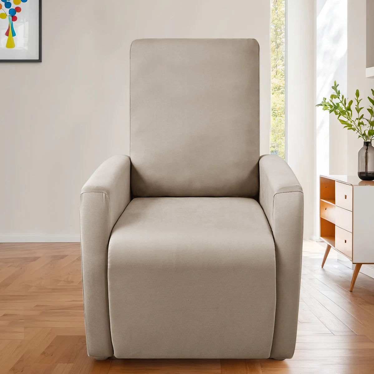A beige milk silk stretch sofa cover set for accent chairs displayed in a bright room.
