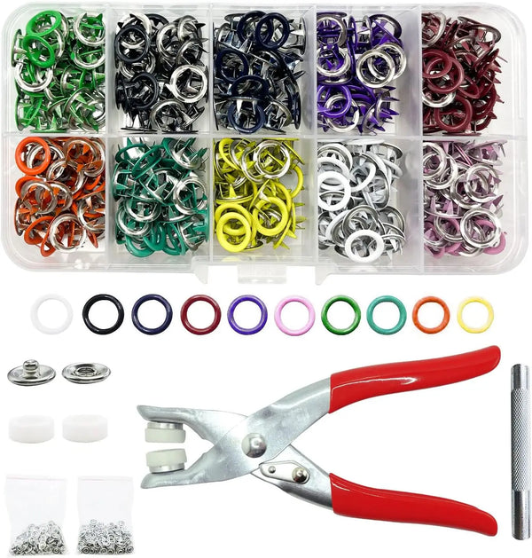 A kit of metal snap buttons and various sized rings for DIY sewing projects, including a pair of pliers.