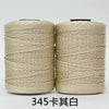 Spool of beige hand knitting and crochet cord for crafting