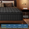 A close-up view of a black quilted mattress with 10/12 inch thickness options for twin, full, queen, and king sizes.