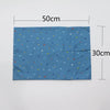 A rectangular blue soft cotton baby pillow cover patterned with small colored hearts and shapes.