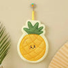 A yellow pineapple shaped coral fleece hanging hand towel with a small hanging loop.