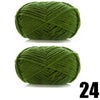 A ball of thick, moss green velvet yarn, tightly twisted and textured.