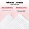 White disposable compressed fiber face towels showing plain textured and EF patterned surfaces