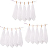 A set of ten white cotton face towels hanging on a clothesline.