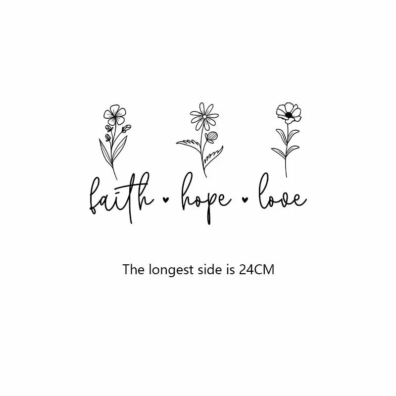 A black line drawing featuring the words faith hope and love, each accompanied by a small flower illustration.
