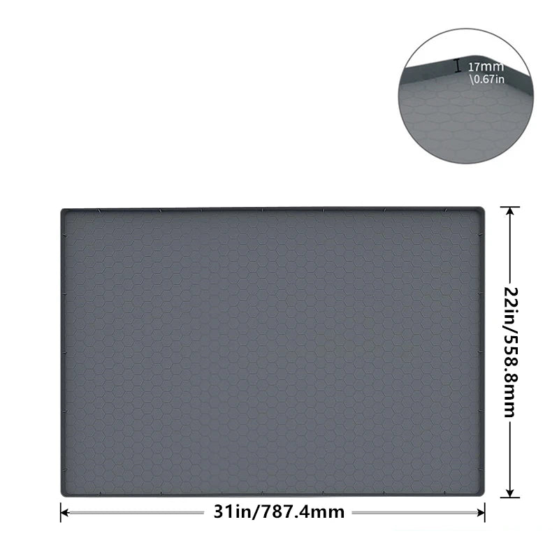 Gray silicone under sink drain mat measuring 22in by 31in with a 17mm thickness.