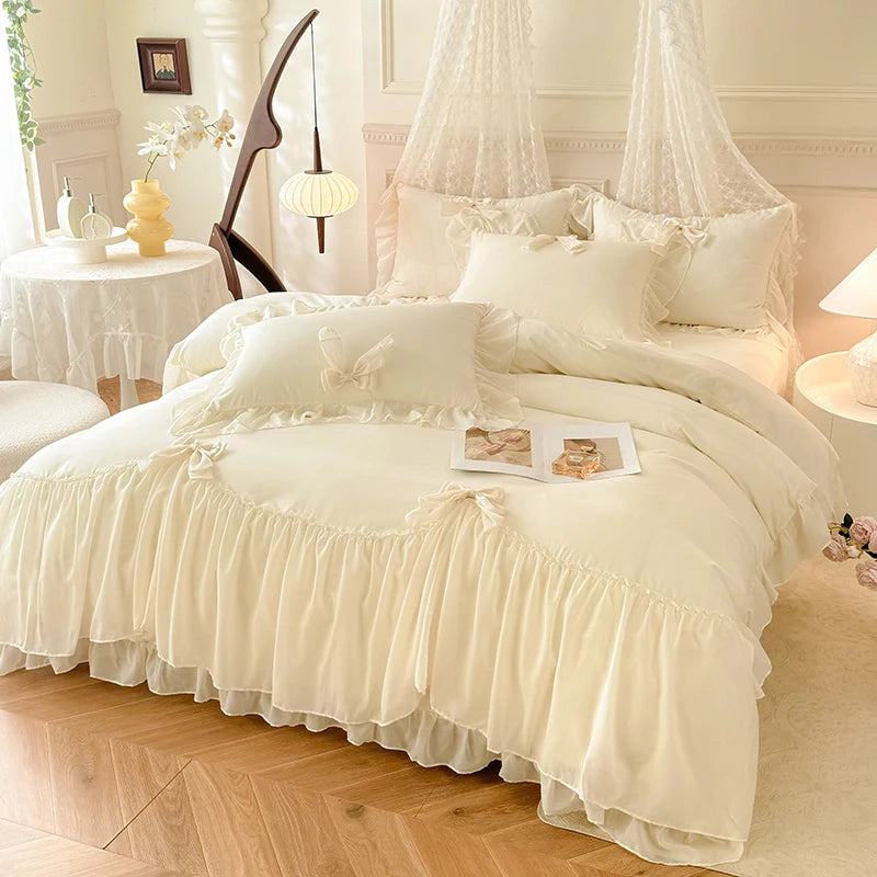 A luxurious white princess chiffon duvet cover set displayed on a bed with sheer fabric drapery.
