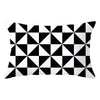 A square decorative pillow cover featuring a black and white geometric tessellation pattern.