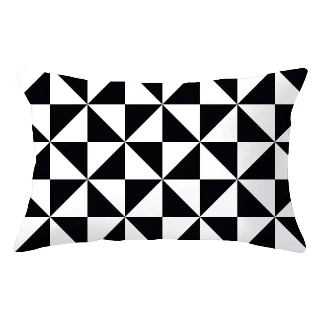 A square decorative pillow cover featuring a black and white geometric tessellation pattern.
