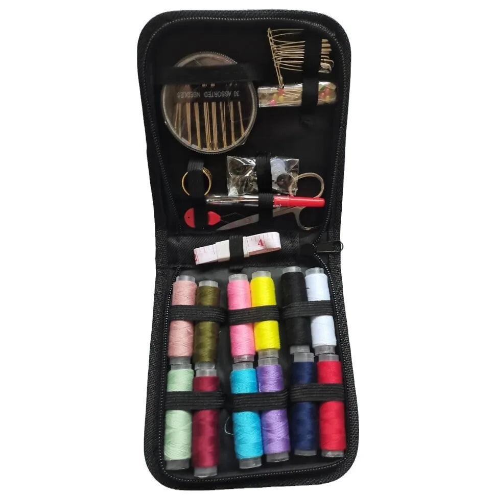 A black portable sewing kit containing various tools, needles, and spools of thread.