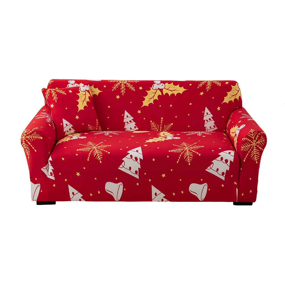 A red festive sofa cover featuring a pattern of gold and white Christmas motifs on a sofa.