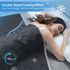 A woman is sleeping comfortably under a dark gray blanket, demonstrating the double-sided cooling effect.
