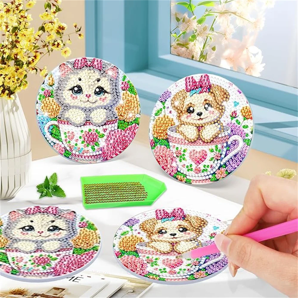A set of diamond painting coasters featuring cute animal designs like a bear and a kitten on colorful floral backgrounds.