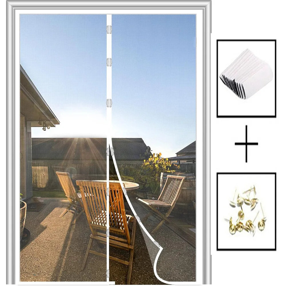 A magnetic screen door curtain is shown in a glass door frame, next to a stack of white paper and some dried yellow flowers.